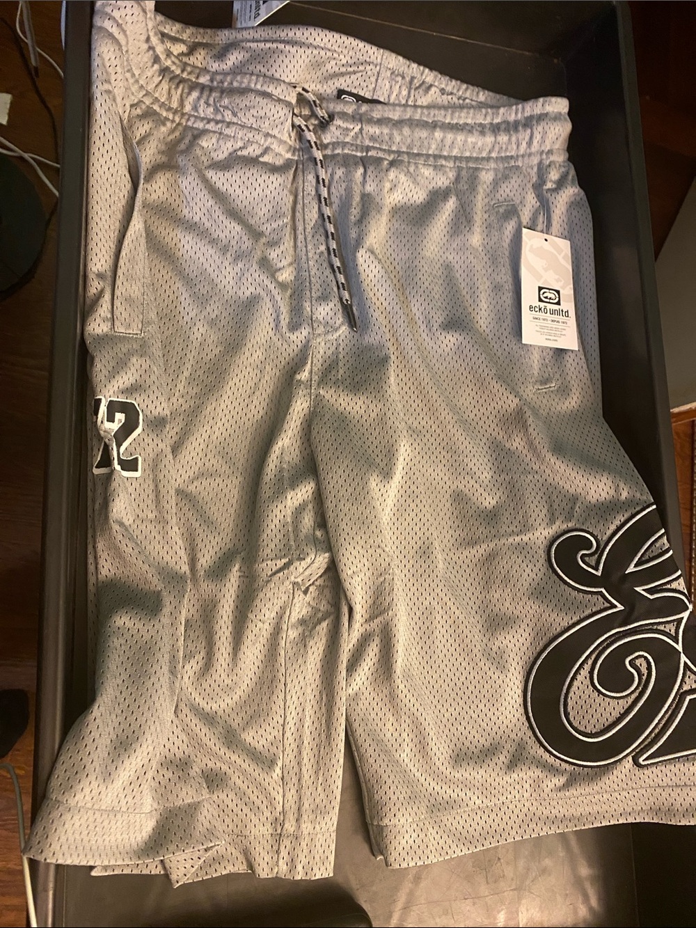 Ecko Unlimited Men's Silver/Grey Mesh Athletic Shorts with Script Logo